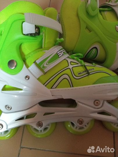 Роликовые коньки