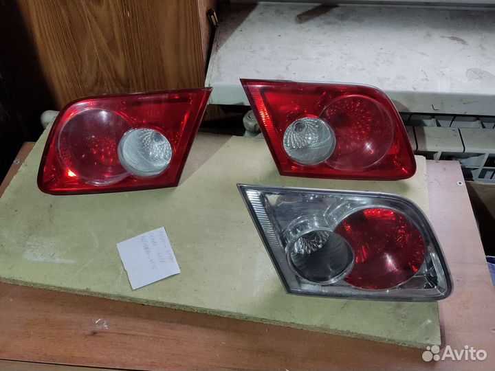 Фонарь задний в крышку багажника Мазда 6 GG