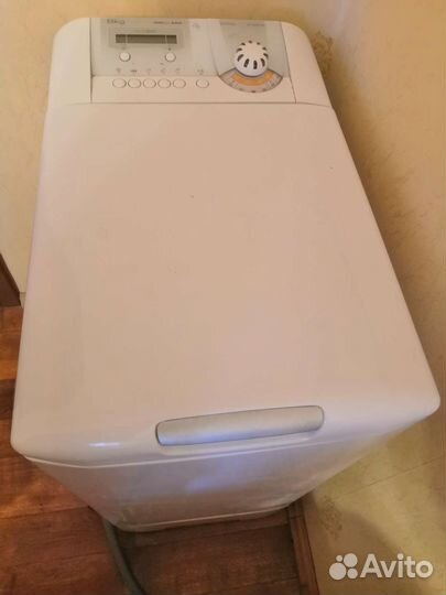 Стиральная машина с вертикальной загрузкой