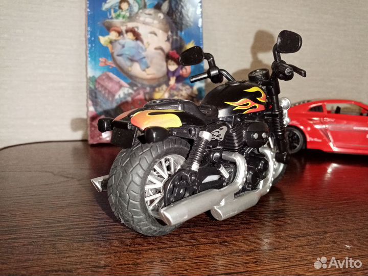 Игрушечный мотоцикл