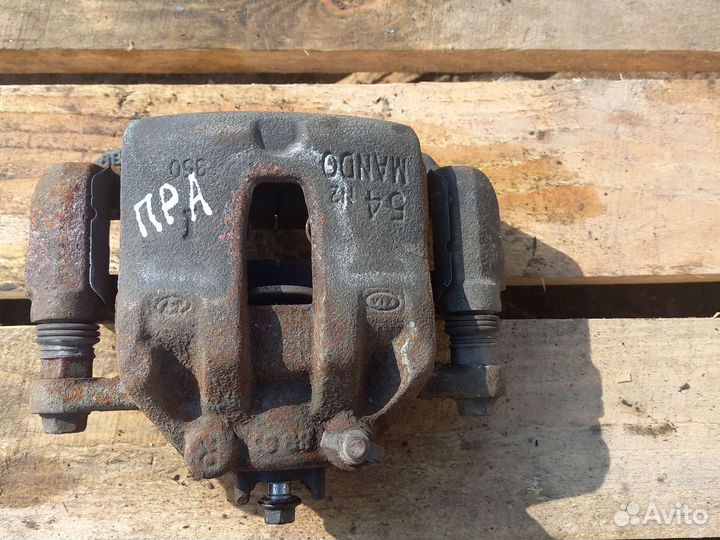 Суппорт передний правый kia rio 4