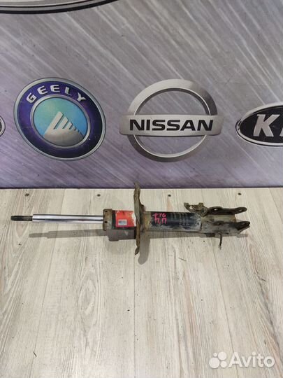 Амортизатор стойка перед Nissan almera N16 Прав