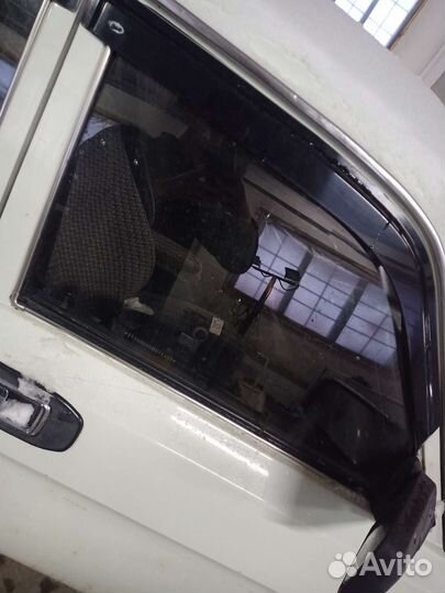 Стекло переднее правое волга