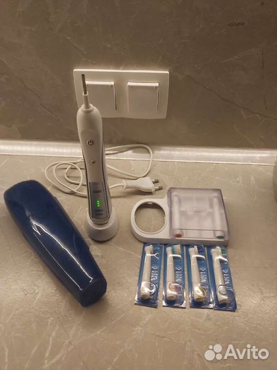 Электрическая зубная щетка braun oral b