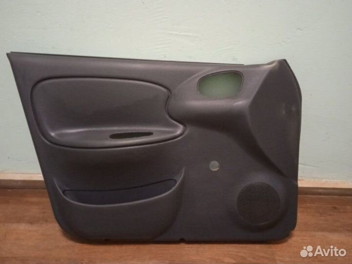 Обшивка двери передняя левая Chevrolet Lanos седан