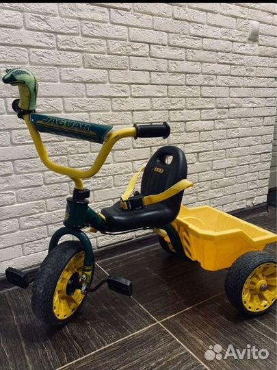 Трехколесный велосипед с прицепом