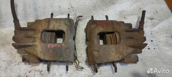 Суппорта тормозные передние для Ford Focus I