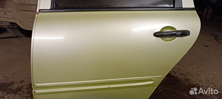 Задняя левая дверь калина 1