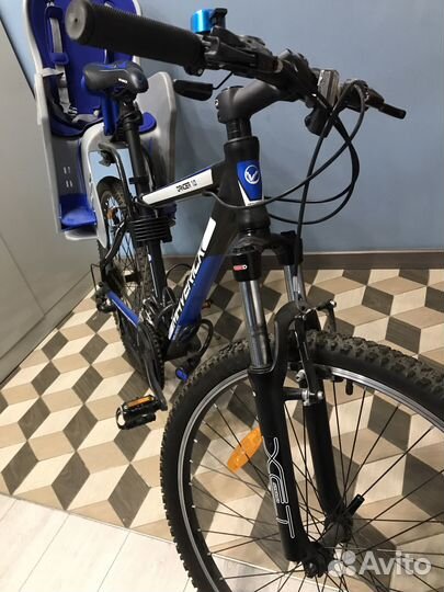 Продаю велосипед с детским креслом