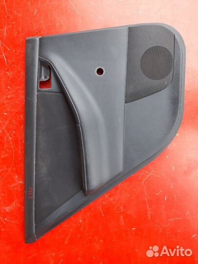 Облицовка двери задняя левая Toyota Corolla E120