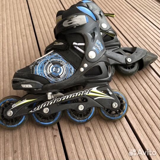 Коньки роликовые