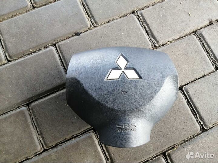 Подушка безопасности в руль Митсубиси Лансер 10
