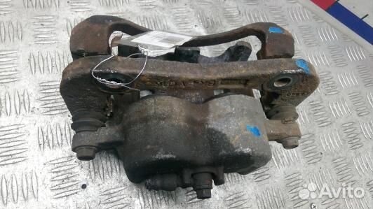 Суппорт тормозной передний левый KIA carnival 2 (K