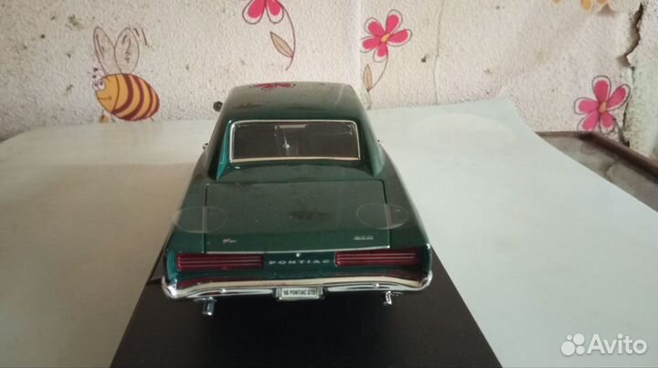 Модель автомобиля Pontiac GTO 1966 Welly 1/18