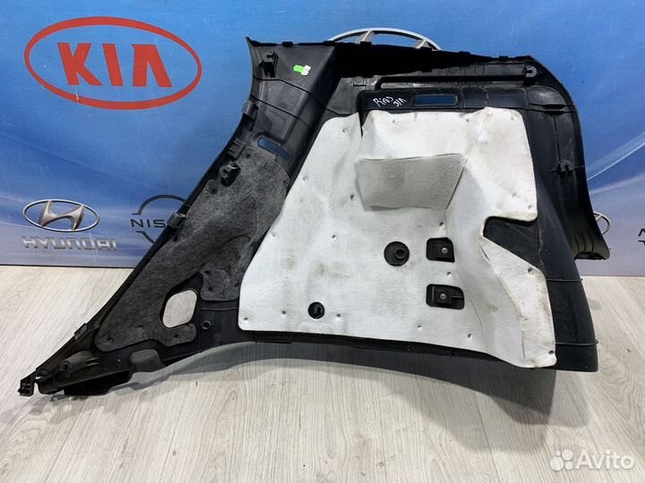 Обшивка багажника Kia RIO 3 Лев