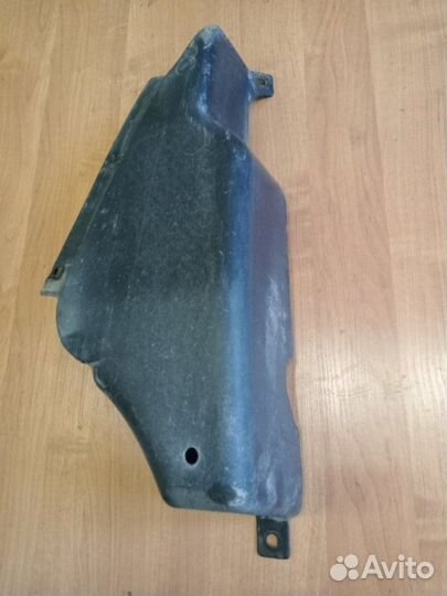 Пыльник крыла задний левый Volkswagen Passat B5