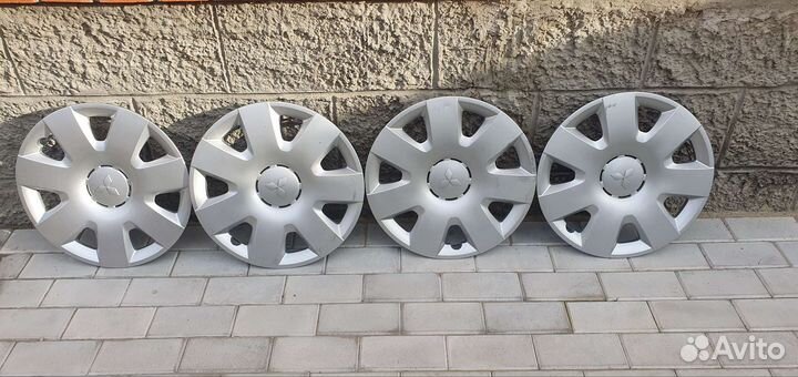 Оригинальные колпаки Lancer 10