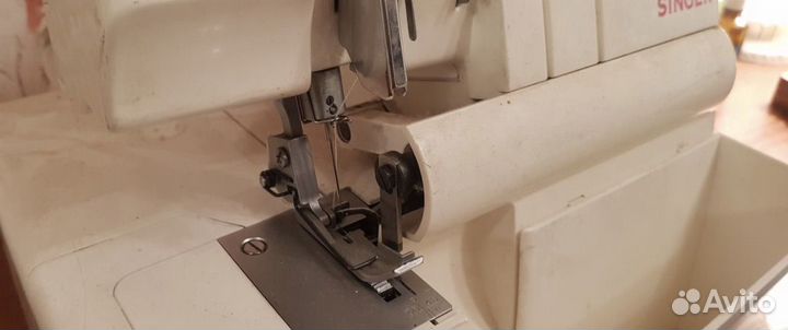 Оверлок четырехниточный Singer