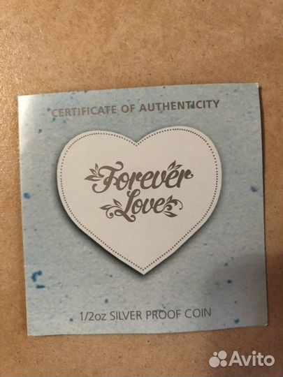 Серебряныая монета новая