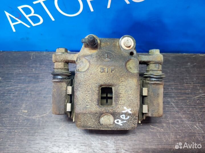 Суппорт тормозной задний SsangYong Rexton 1