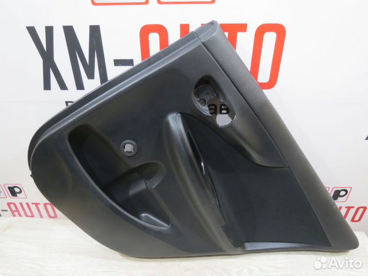 Обшивка двери задняя правая Toyota Corolla 150