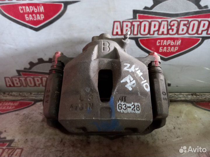 Суппорт тормозной передний левый Toyota Isis ZNM10