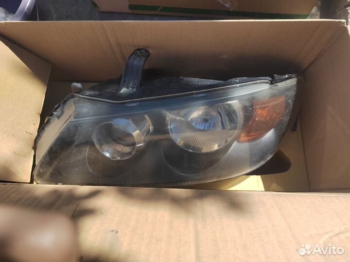 Фара левая Nissan Almera n16