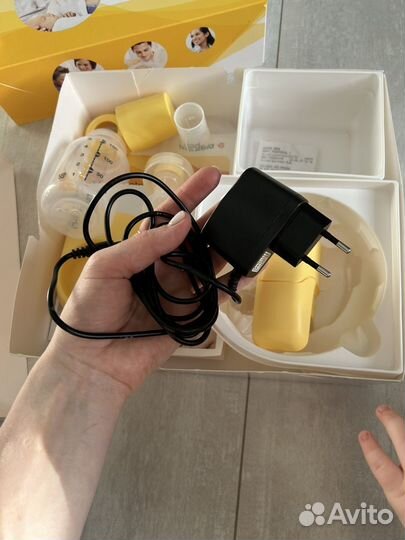 Молокоотсос medela электрический