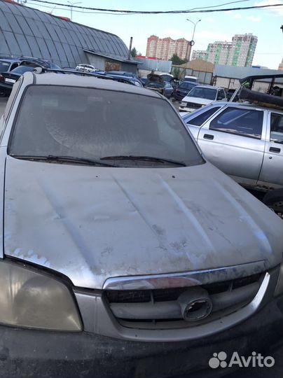 Капот Mazda Tribute 1