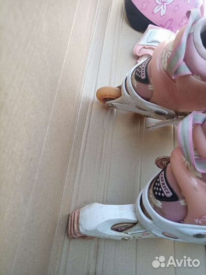 Роликовые коньки