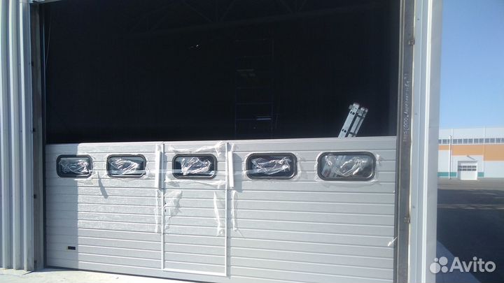 Монтаж порталов, ворот, роллет, дверей