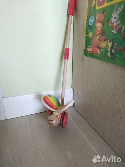 Игрушка каталка с ручкой 