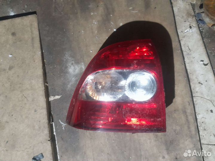 Задний левый фонарь приору