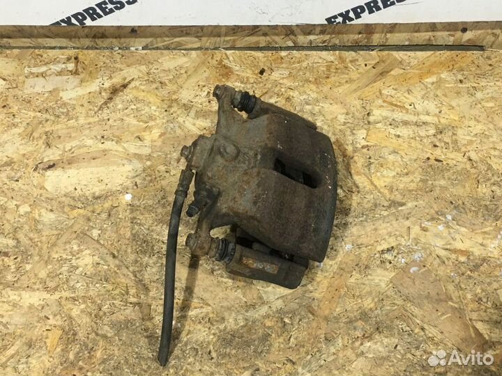 Суппорт тормозной передний левый Skoda Octavia A7