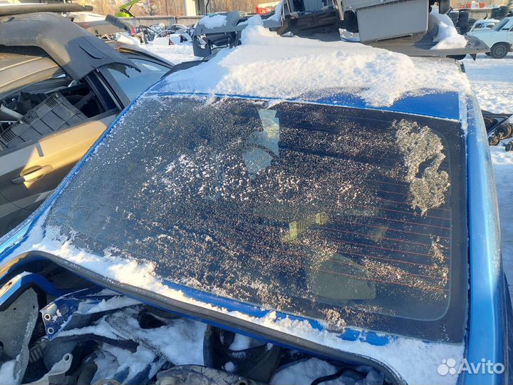 Стекло заднее Renault Logan