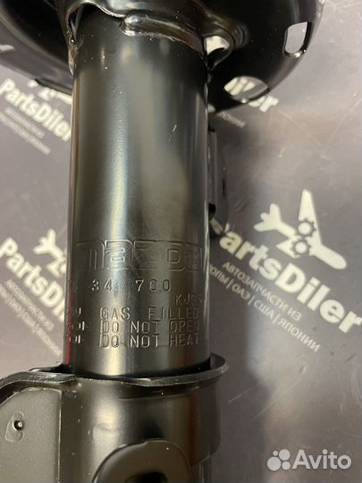 Амортизатор передний правый GHT634700B Mazda