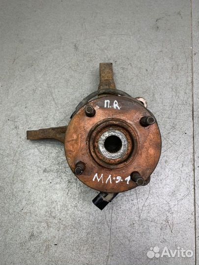 Кулак поворотный передний правый Mitsubishi Lancer