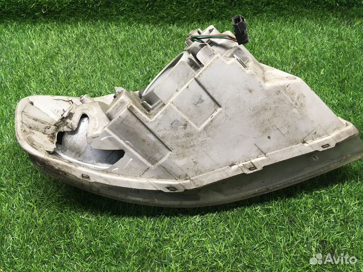 Фара левая Chevrolet Aveo T250