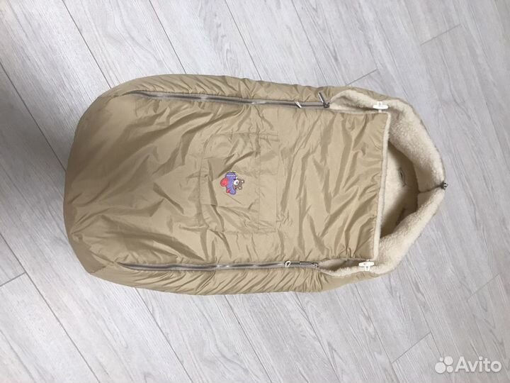 Меховой конверт в коляску