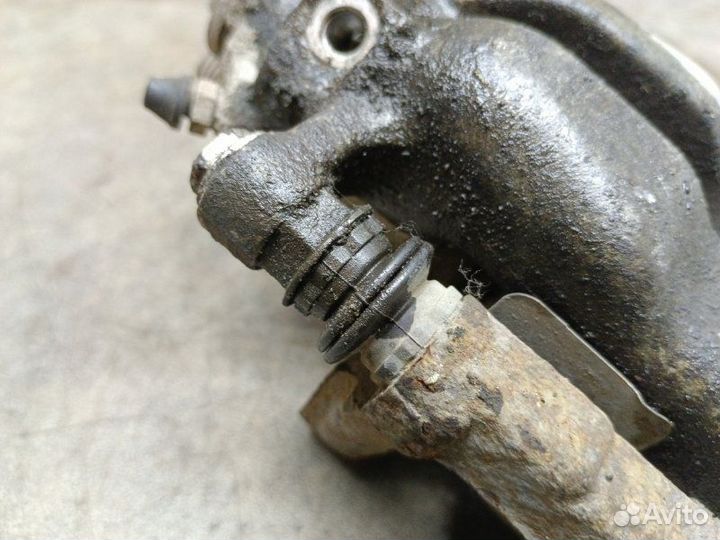 Суппорт задний левый Opel Astra H (3D) 1.6 Z16XER