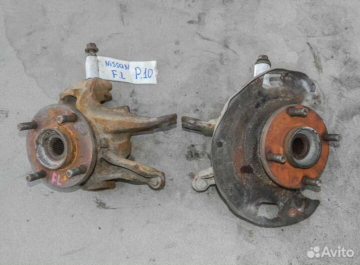 Кулак поворотный левый Nissan Primera P10