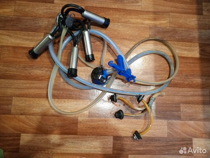 Подвесная часть доильного аппарата