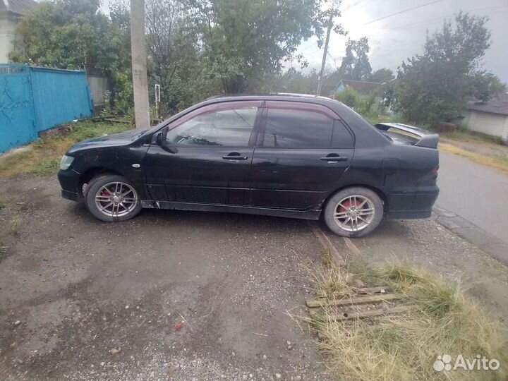 Mitsubishi Lancer 1.6 МТ, 2002, 27 000 км