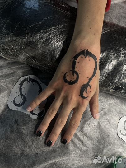 Тату-мастер