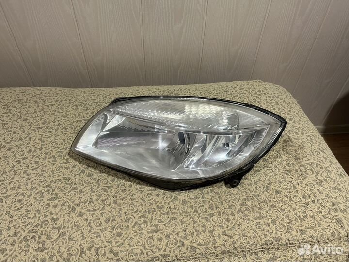 Оригинальная фара(левая) skoda Roomster 2009