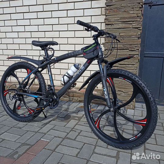 Новый на 26 литых дисках, 21 скорость shimano