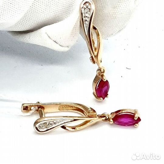 Золотые серьги с камнем