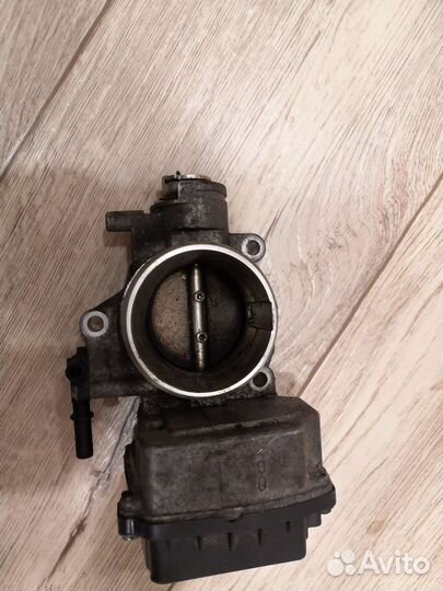 Дроссельная заслонка