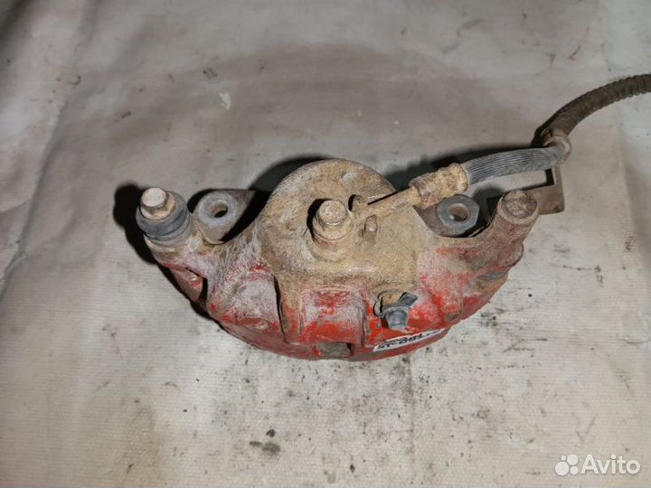 Суппорт тормозной передний левый Hyundai Accent