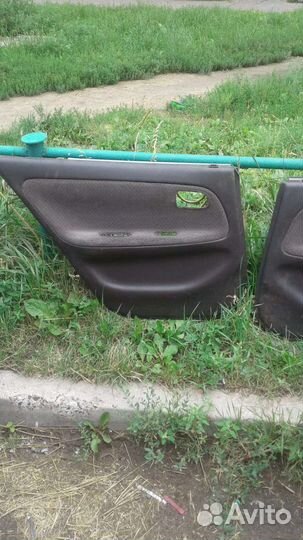 Обшивка на двери Toyota Sprinter ae100